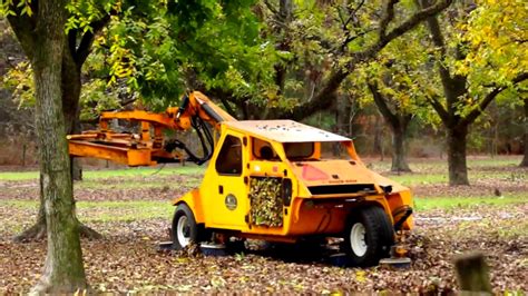 pecan shaker skid steer|pecan harvesting equipment.